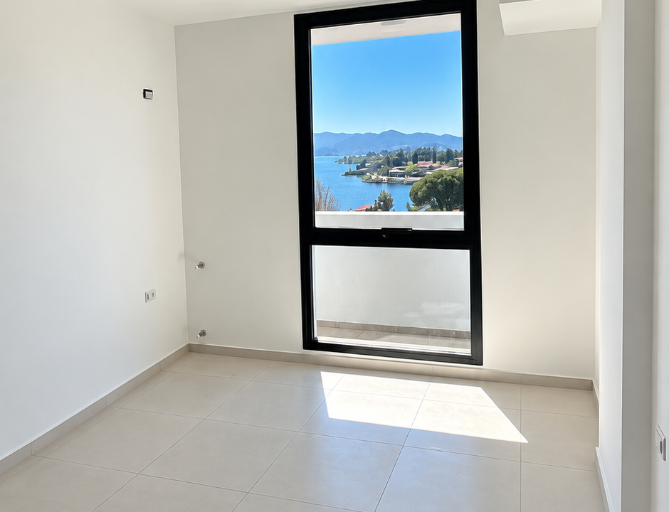 Habitación minimalista con vistas al lago